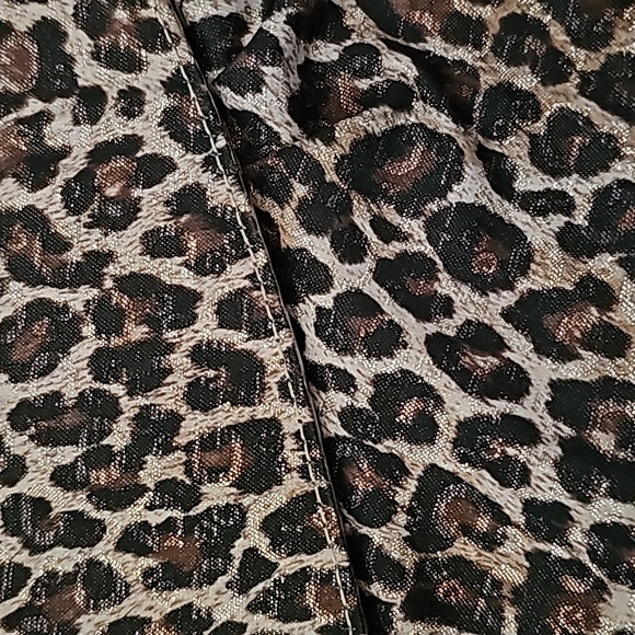 GUESS clutch bag. Animal print w/hearts on inside lining. - Picture 2 of 8